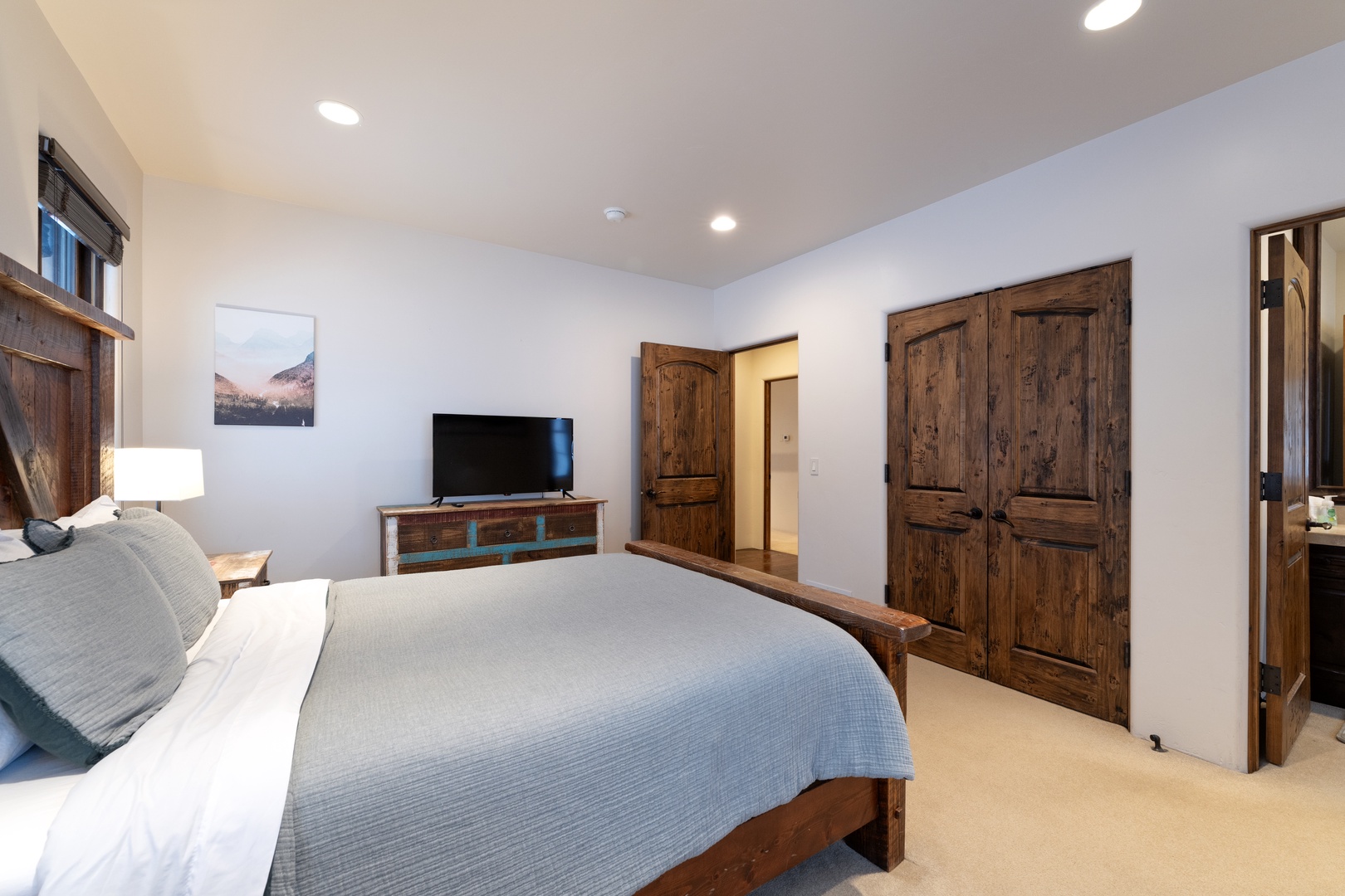 Serene queen suite with soft light