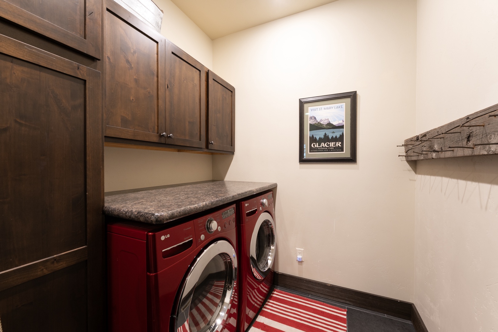You'll appreciate the convenience of an in-unit laundry room with a washer and dryer, plus generous cabinet storage overhead for all your essentials.