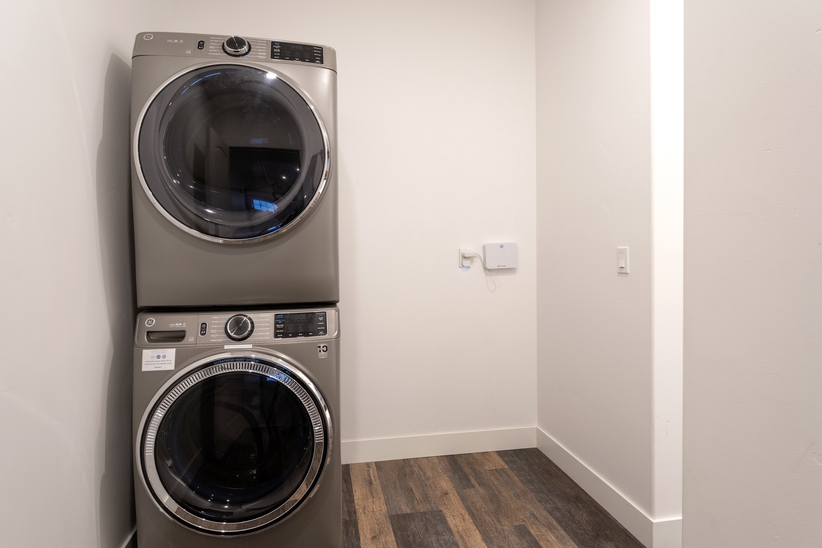 Keep your clothes fresh in your own private laundry room with modern washer and dryer—perfect for longer stays.