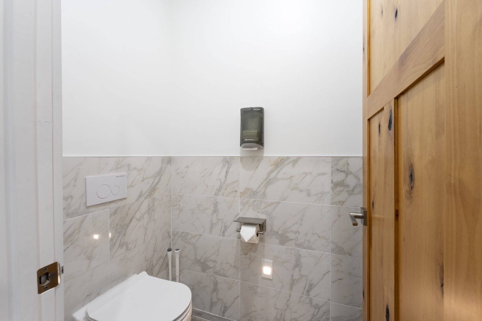 Sleek marble finishes and thoughtful details create a spa-like atmosphere where you can unwind in style and comfort.