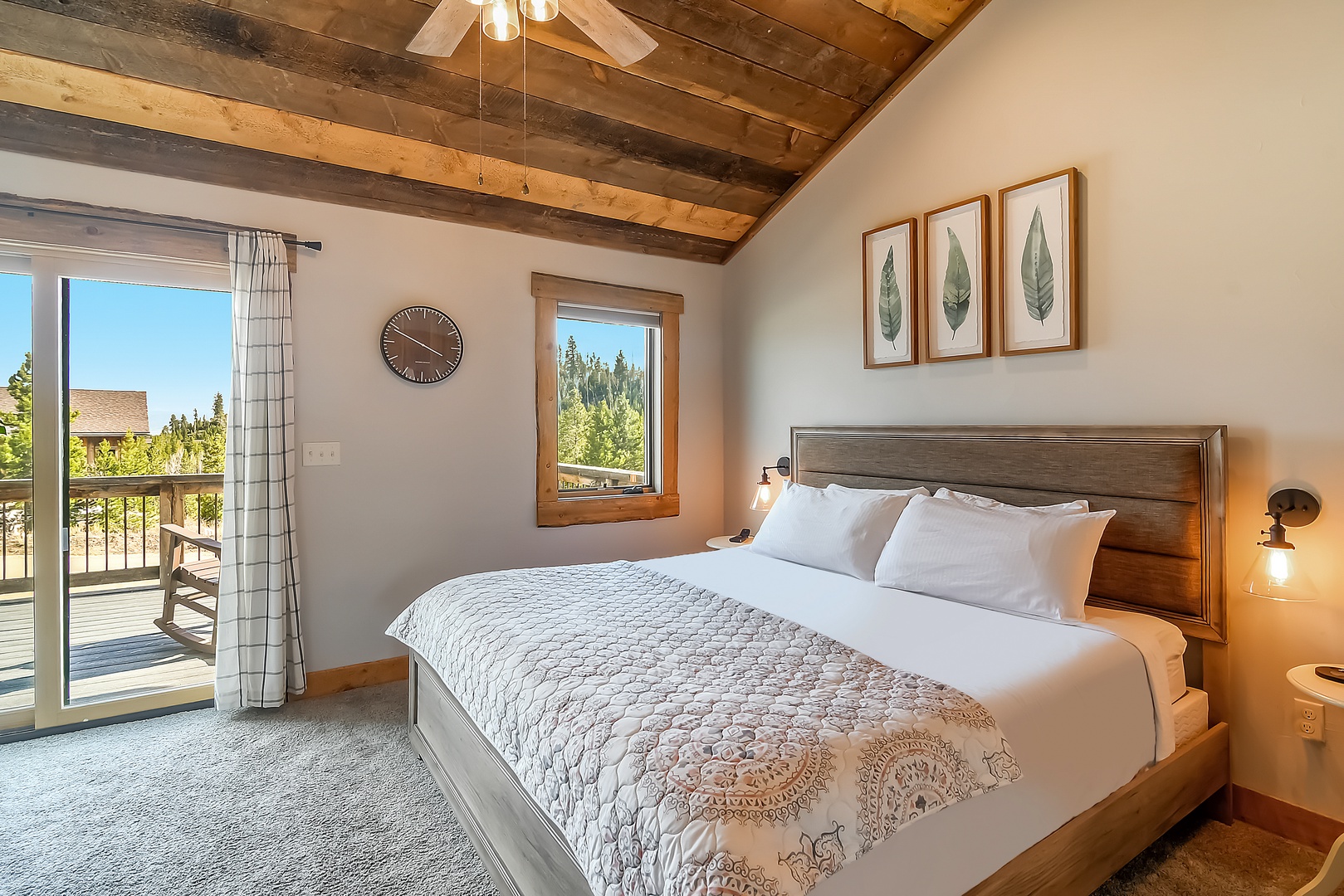 Rest under exposed beam ceilings in your cozy bedroom, where crisp linens and warm wood accents create the perfect retreat.
