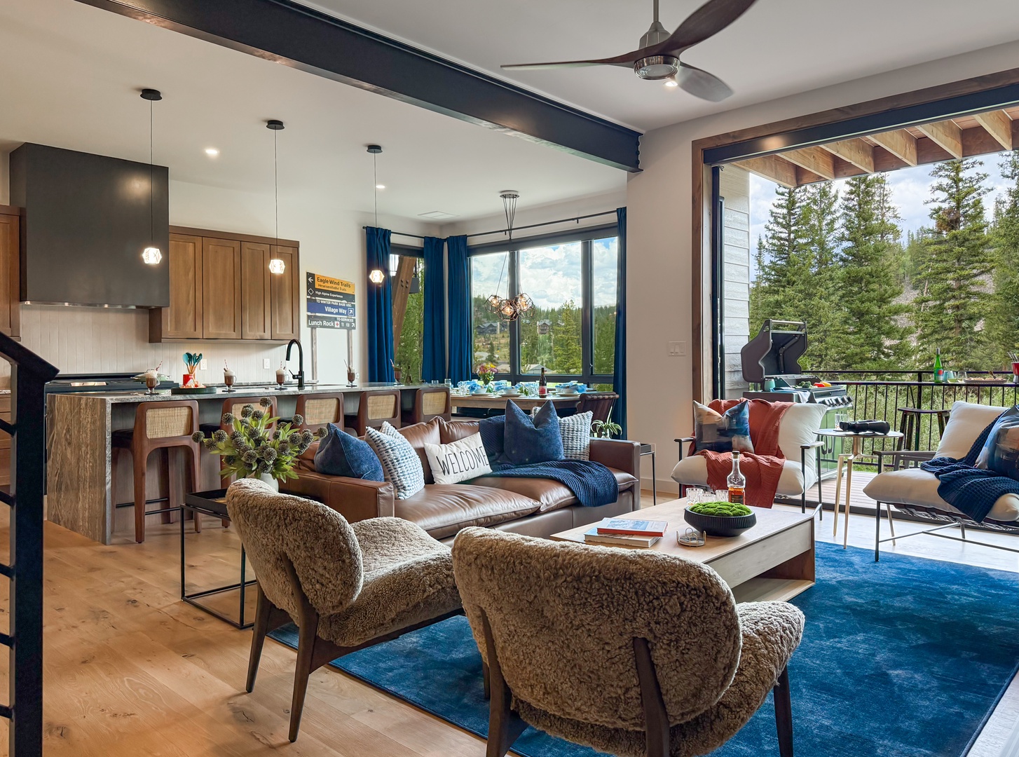 Open up the doors to the deck to extend the living area outside.