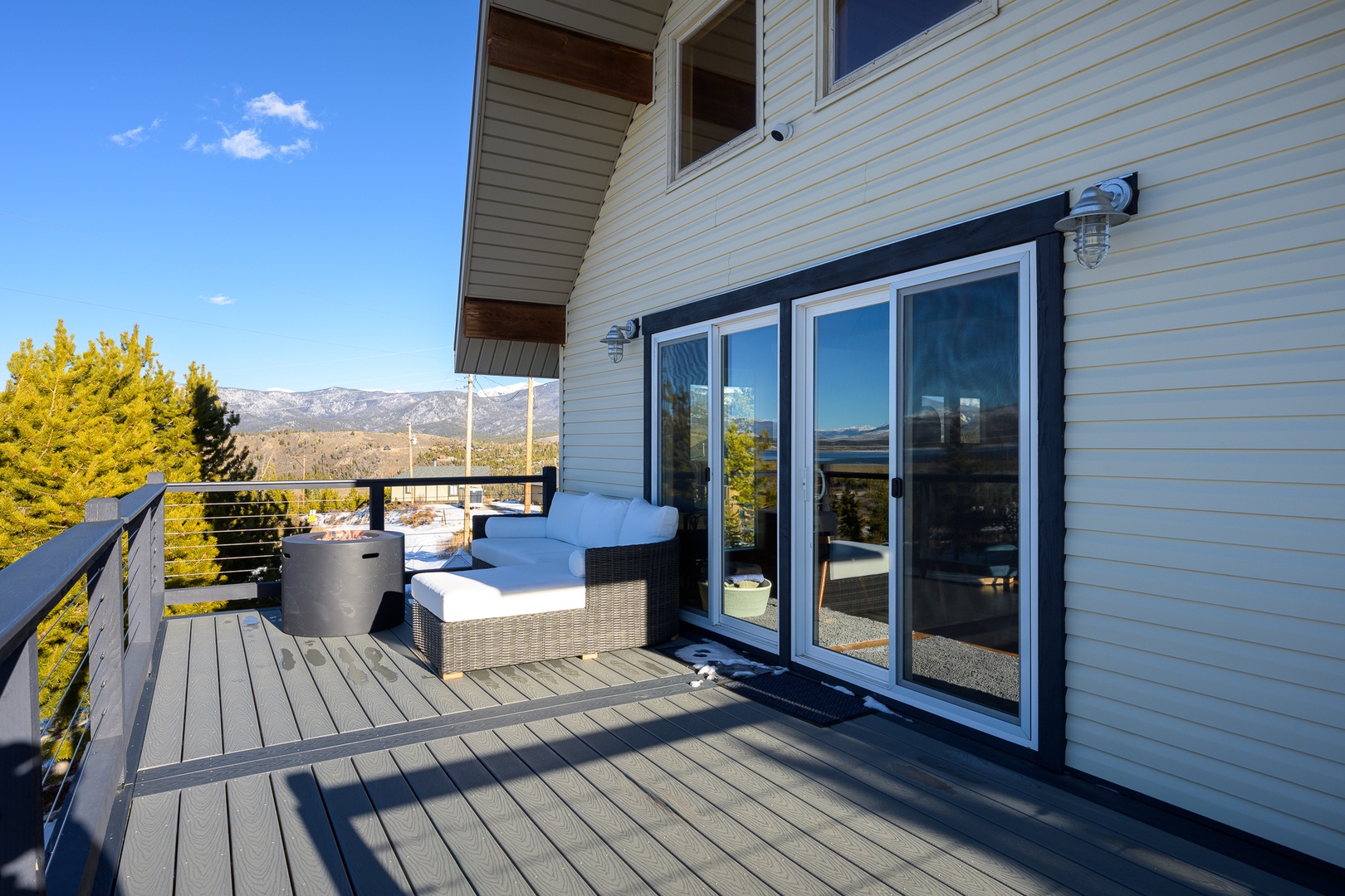 Step onto your private deck where plush seating awaits. Sip morning coffee while soaking in stunning mountain vistas stretching to the horizon.