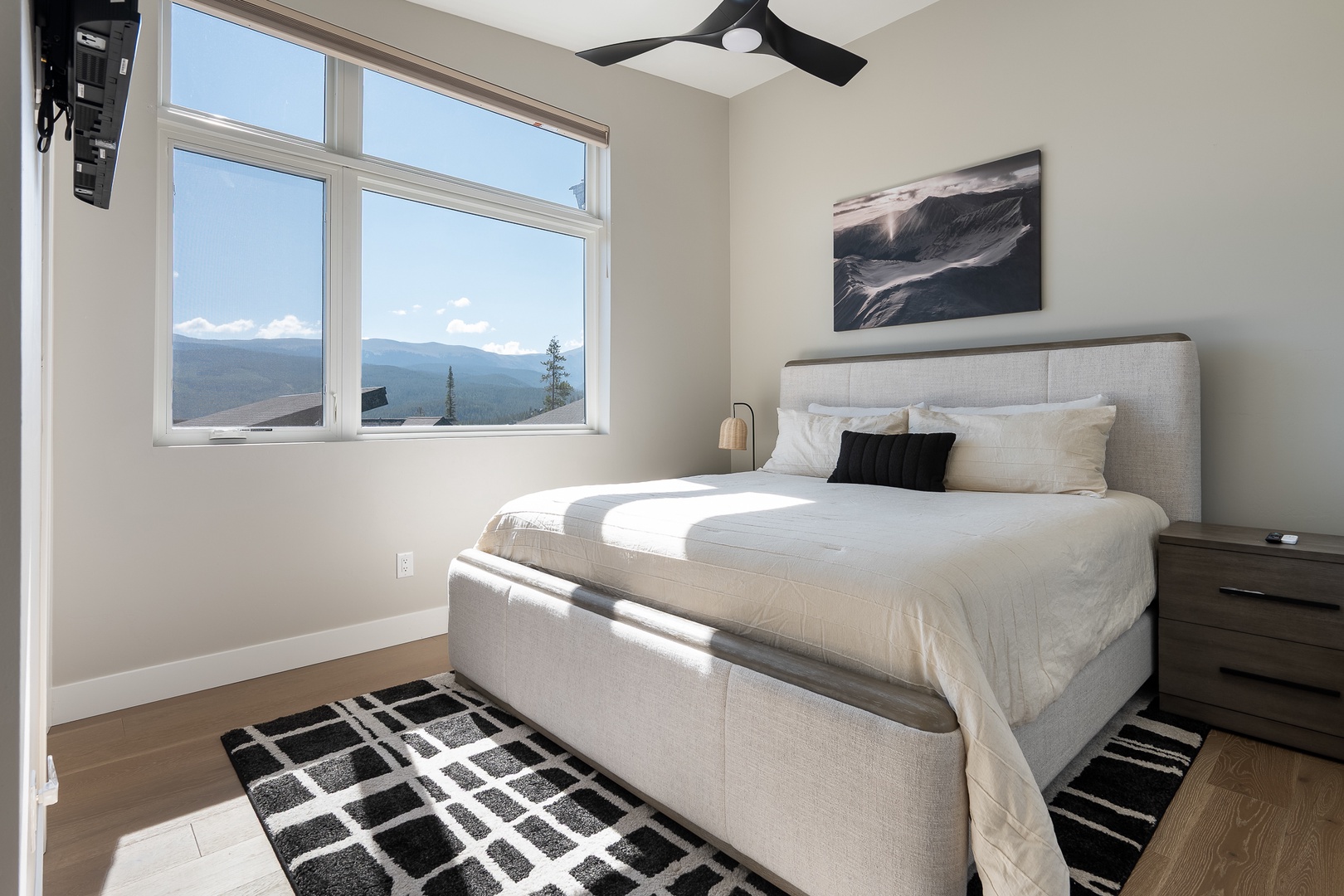 Wake up to stunning mountain views framing your window. Primary bedroom with King Bed and attached Ensuite.