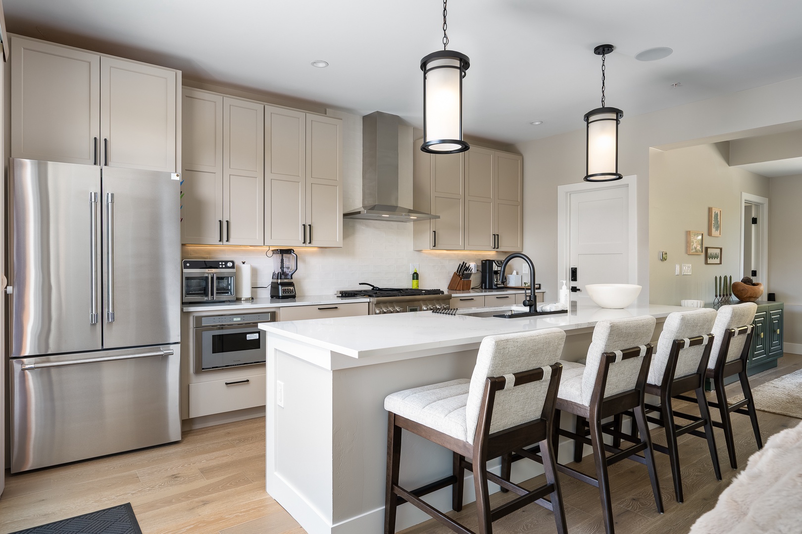 Enjoy family breakfasts or evening cocktails—a bright, welcoming heart for your stay.