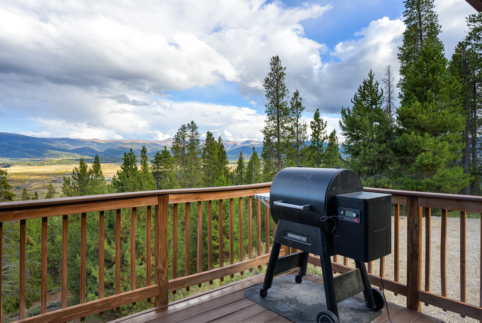 Stunning mountain views surround the deck, where your private grill awaits for memorable outdoor meals surrounded by Colorado's natural beauty.