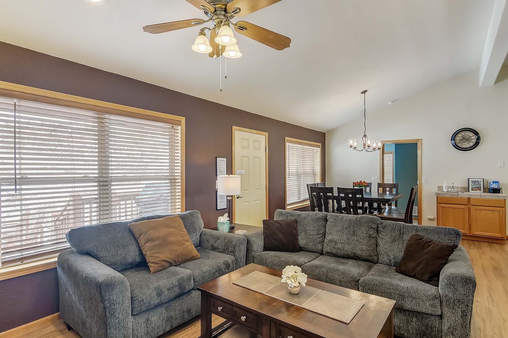 Unwind in your spacious living room with plush sectional seating and dining area perfect for memorable meals together.