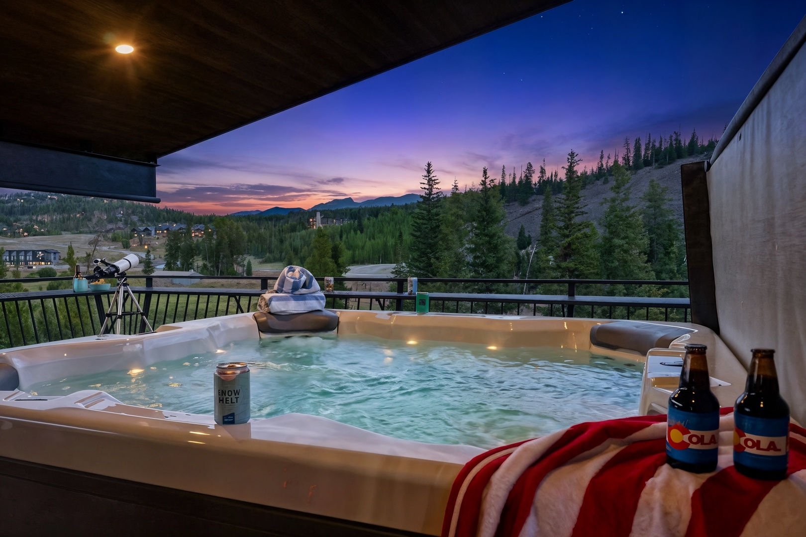 Soak under the stars in your private hot tub, drinks close at hand, as the sunset paints the mountain horizon and the forest stretches out below you.