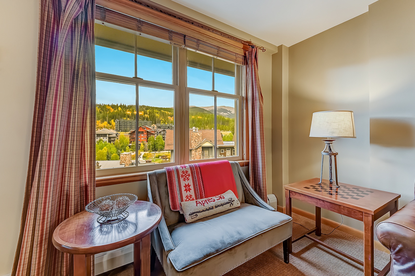 Curl up in your cozy reading nook and soak in sweeping mountain sights and views looking down into the Village