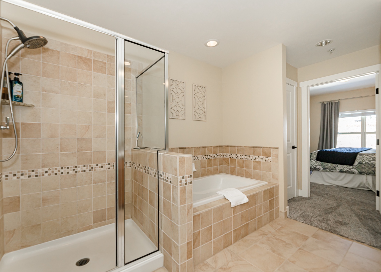 Unwind in your private spa-like bathroom with a luxurious soaking tub and spacious walk-in shower after exploring the day.