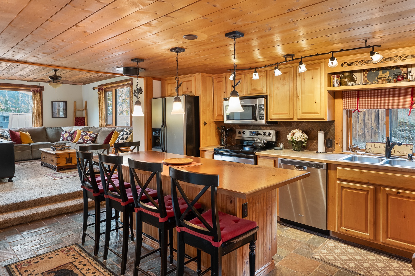 Relax at the bar top island while your chef prepares the meal