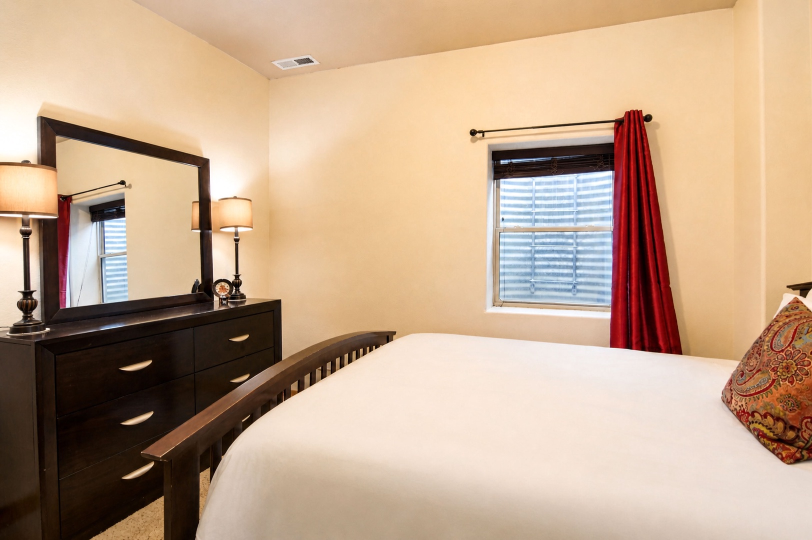 Rest easy in your cozy bedroom, where crisp linens and warm lighting create the perfect retreat after a day of adventure.