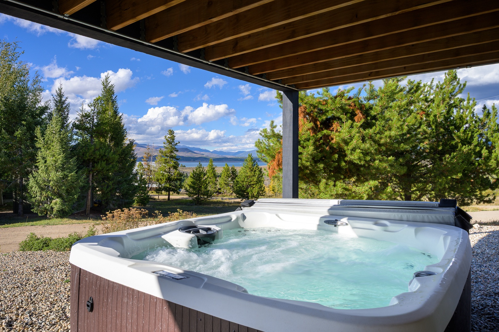 Slip into your private hot tub and soak in the mountain scenery—warm water, fresh air, and endless views make this your perfect retreat.