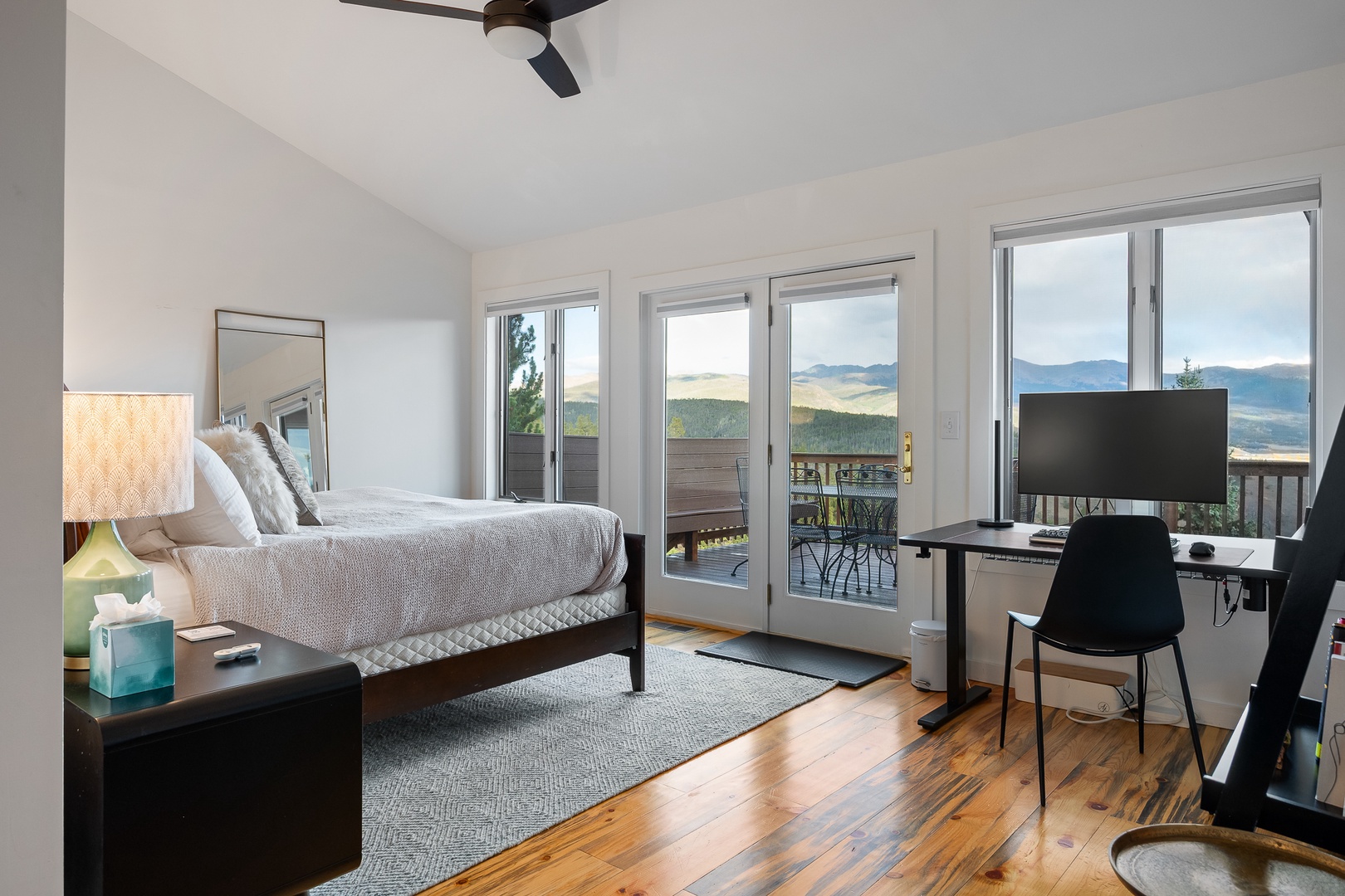 Wake up to stunning mountain vistas framing your private bedroom retreat. Step through the glass doors onto your balcony and let the sunrise greet you with sweeping views that stretch for miles.