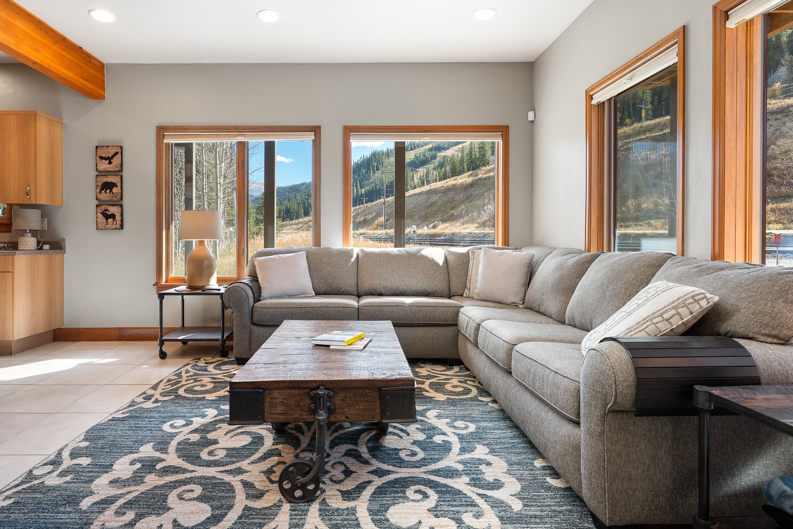 First level living area, windows on every wall bathing the space in natural light