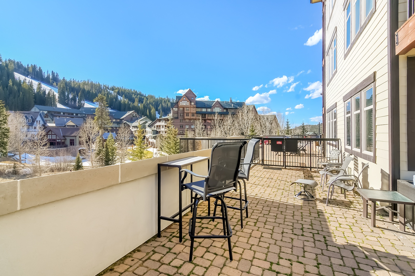 Enjoy your private terrace or walk through the gate to the shared amenities.