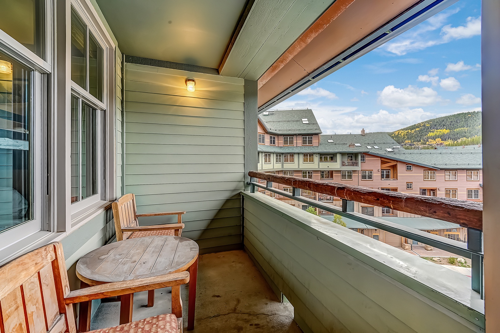 The private patio with stunning mountain views overlooking the Village activity