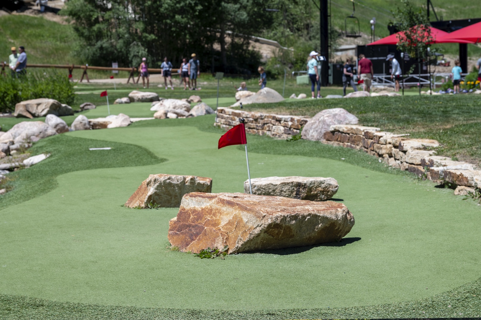 Fun putt-putt golf under the summer sun.