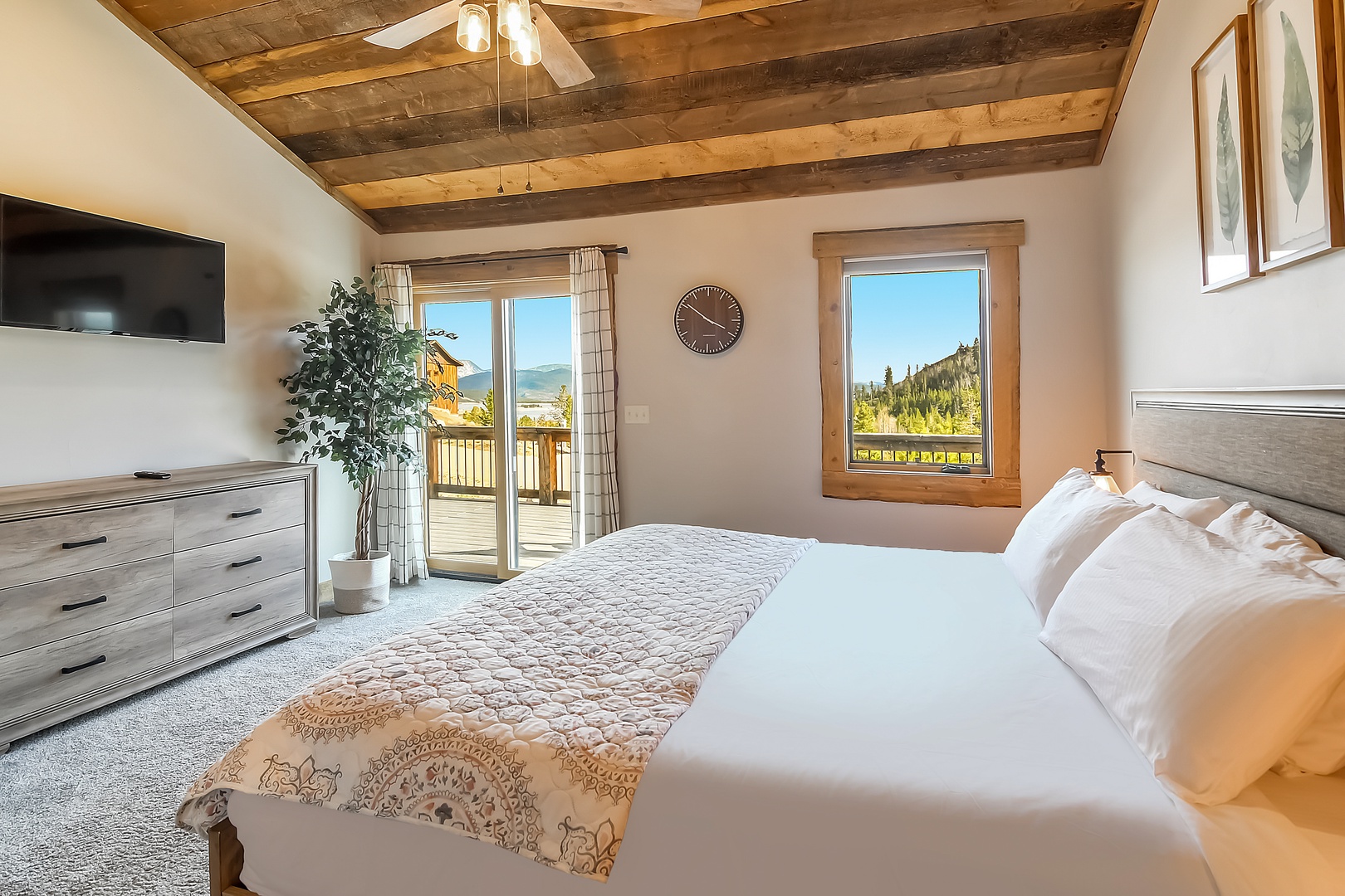 Wake up to mountain views from your cozy alpine bedroom, where rustic wood beams and crisp linens create perfect mountain retreat comfort.