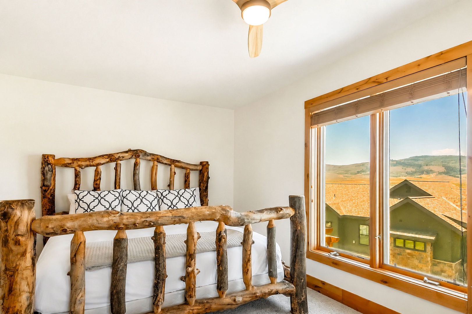 Bedroom #1 with King bed, mountain retreat features perfect for waking up to nature's beauty.