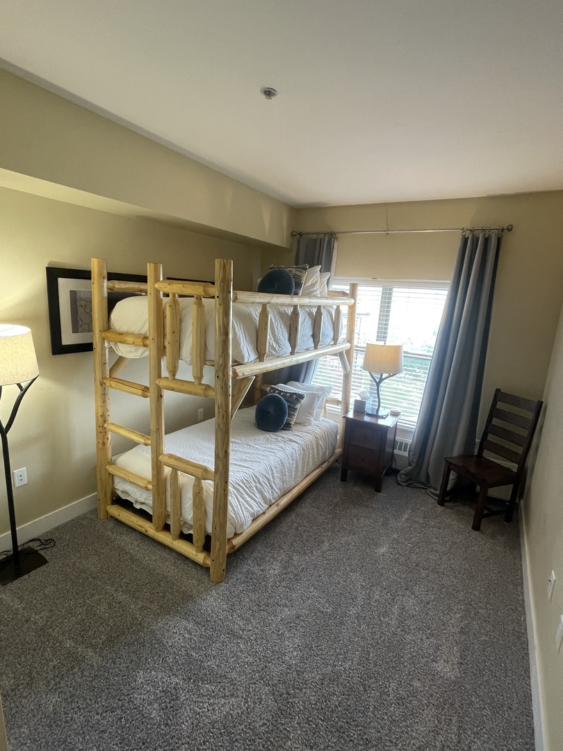 Rest peacefully in your comfortable twin beds with fresh white linens and natural light streaming through windows.