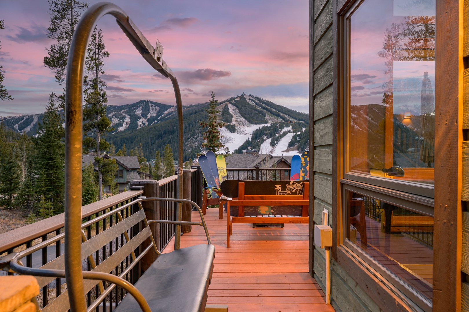 Step onto your private deck where mountain ski slopes stretch before you, creating the perfect backdrop for morning coffee or evening relaxation.