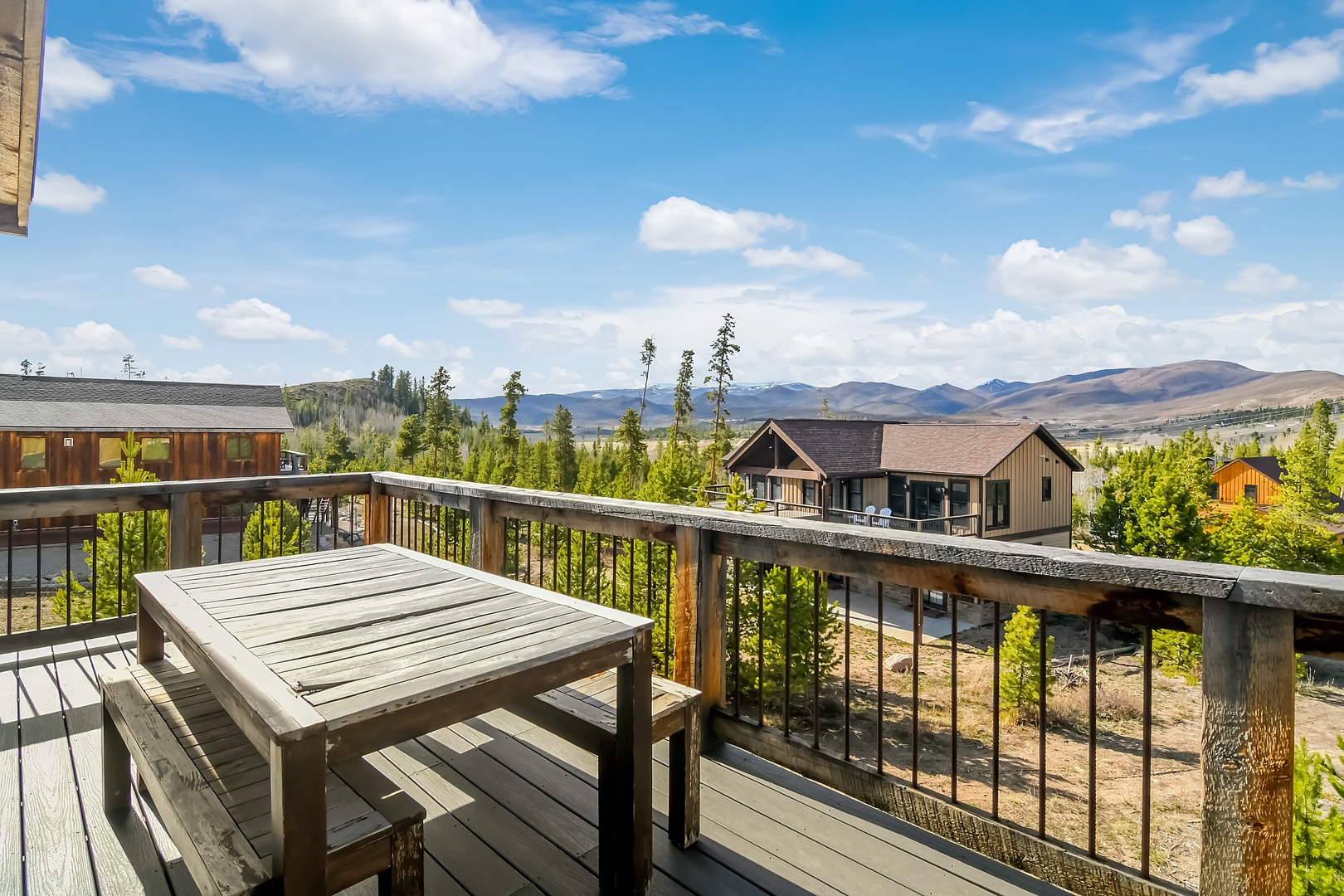 Step onto your private deck and savor morning coffee while soaking in breathtaking mountain vistas that stretch endlessly across the horizon.