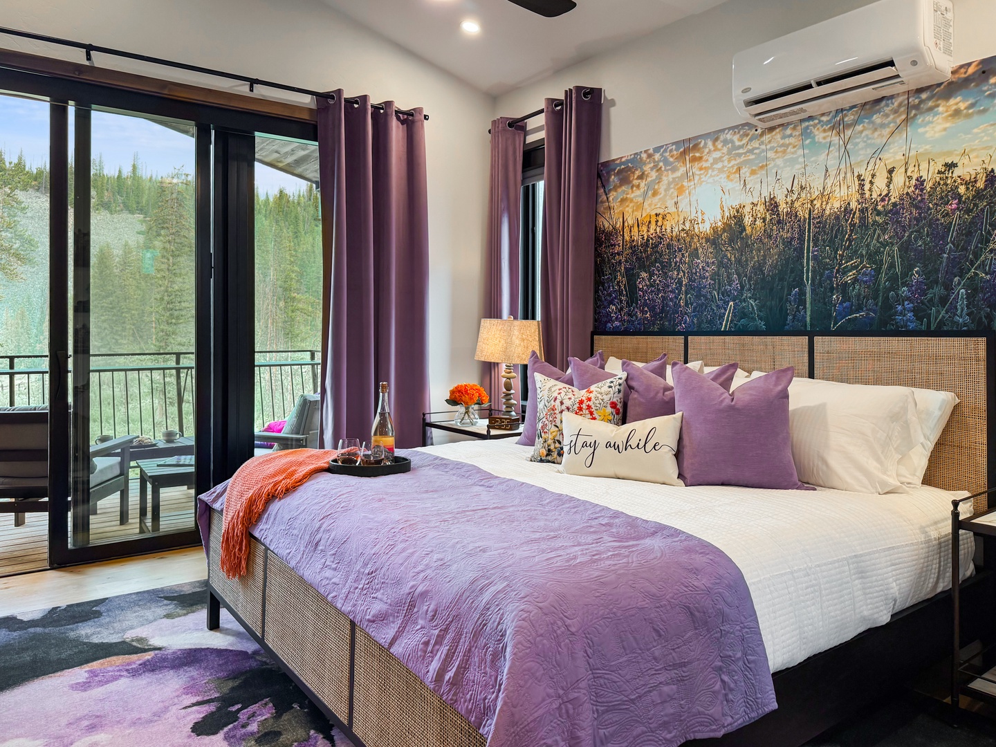Your serene retreat awaits with a plush king bed dressed in soft linens, a private balcony overlooking lush greenery, and modern air conditioning to keep you comfortable all day long.