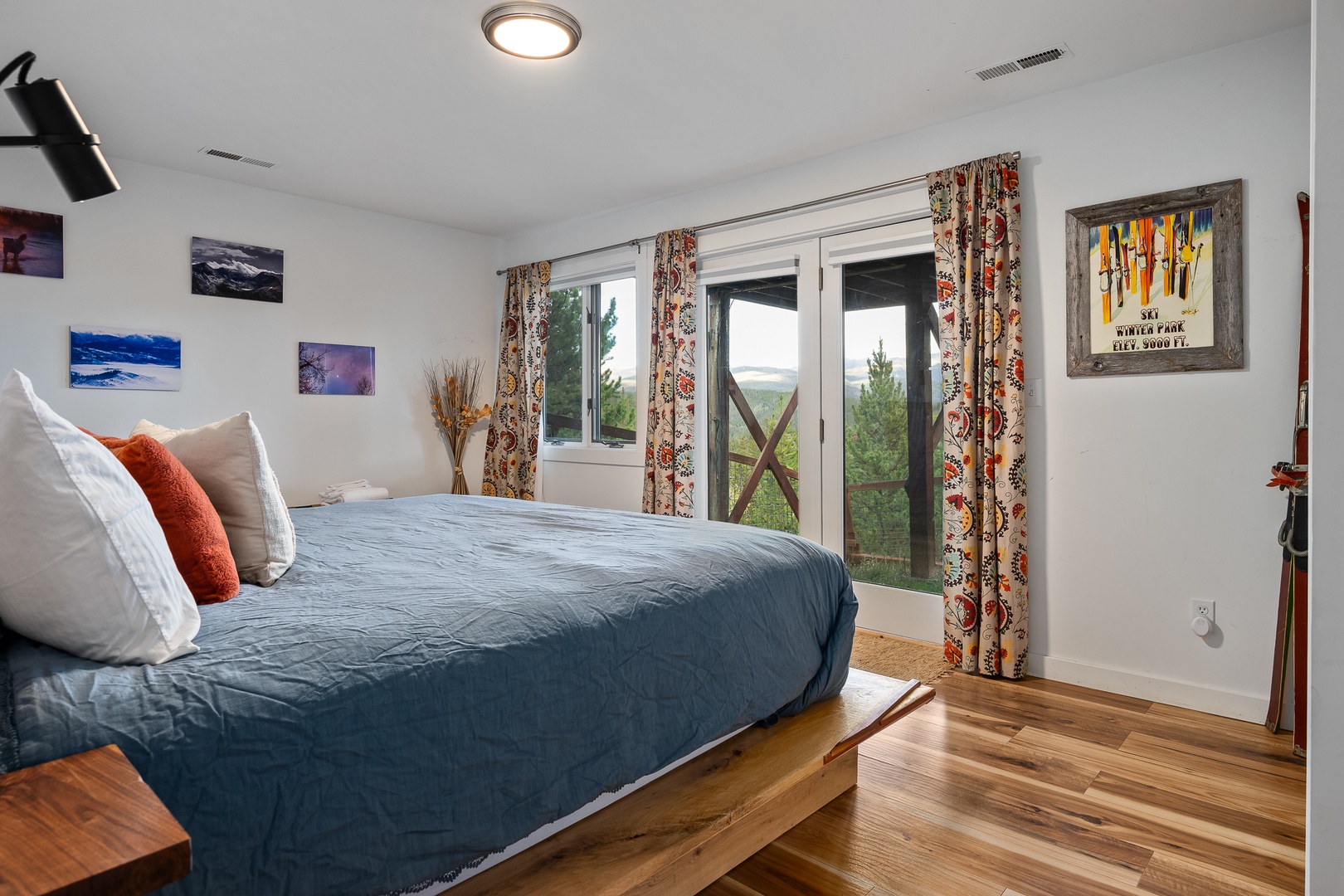 Wake up to stunning mountain views framed by your bedroom windows, where rolling hills and open sky greet you each morning in this bright, peaceful retreat.
