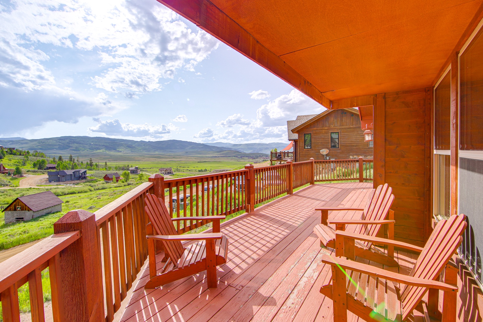 Step onto your private deck and sink into Adirondack chairs while soaking in sweeping valley views that stretch to distant mountains.