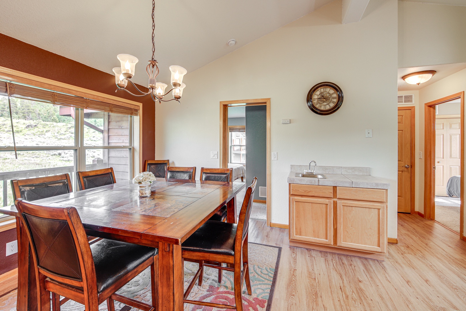 Gather around this elegant dining table for memorable meals with loved ones in your spacious, light-filled dining area.