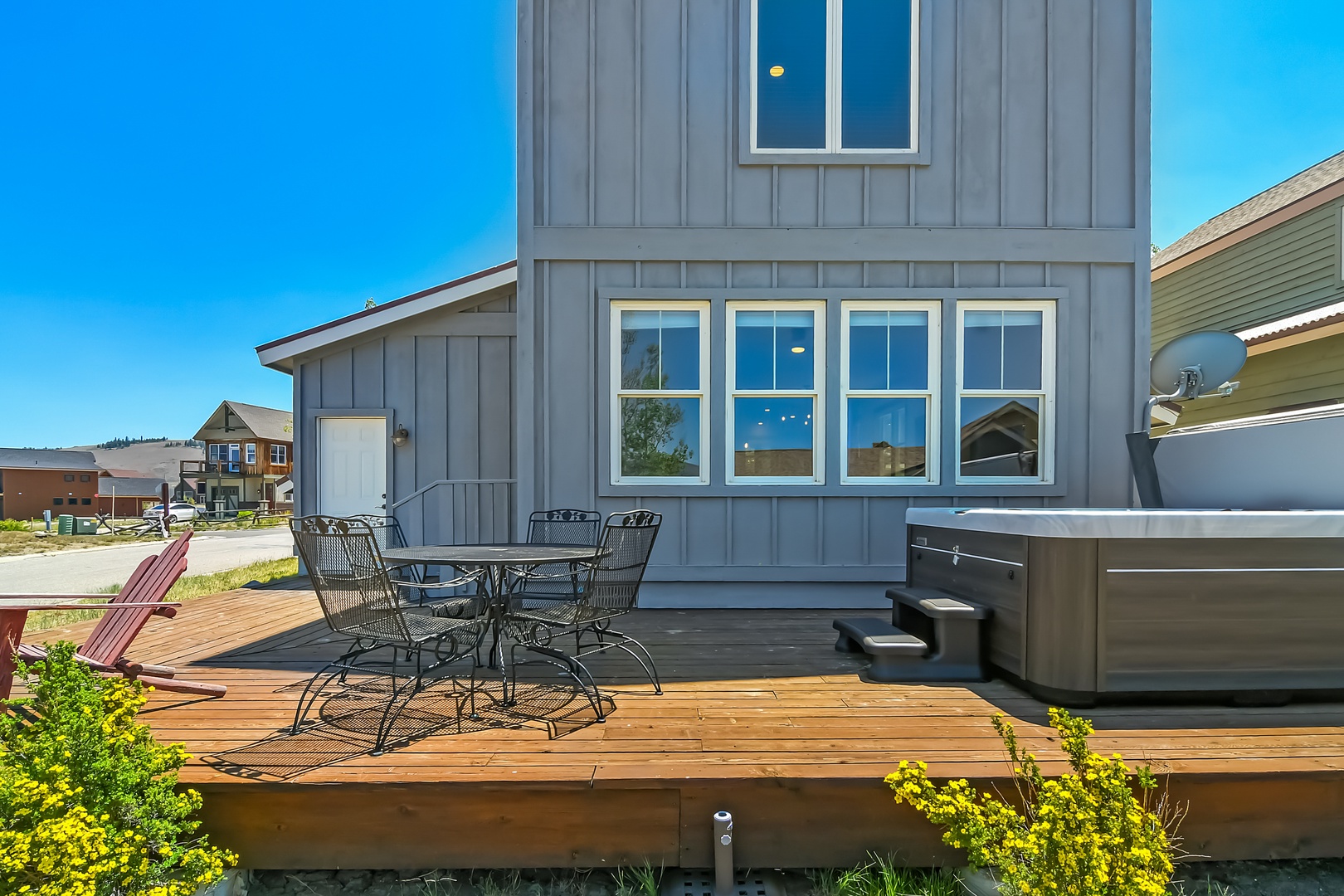 Enjoy cool summer Nights with Mountain-view deck outdoor dining area overlooking the golf course