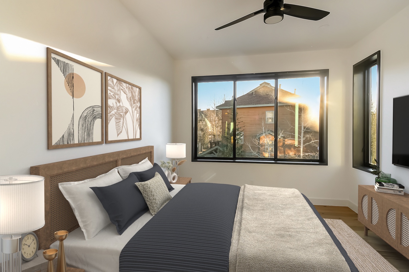Wake up in your tranquil bedroom with natural light streaming through large windows and modern artwork creating a peaceful retreat.