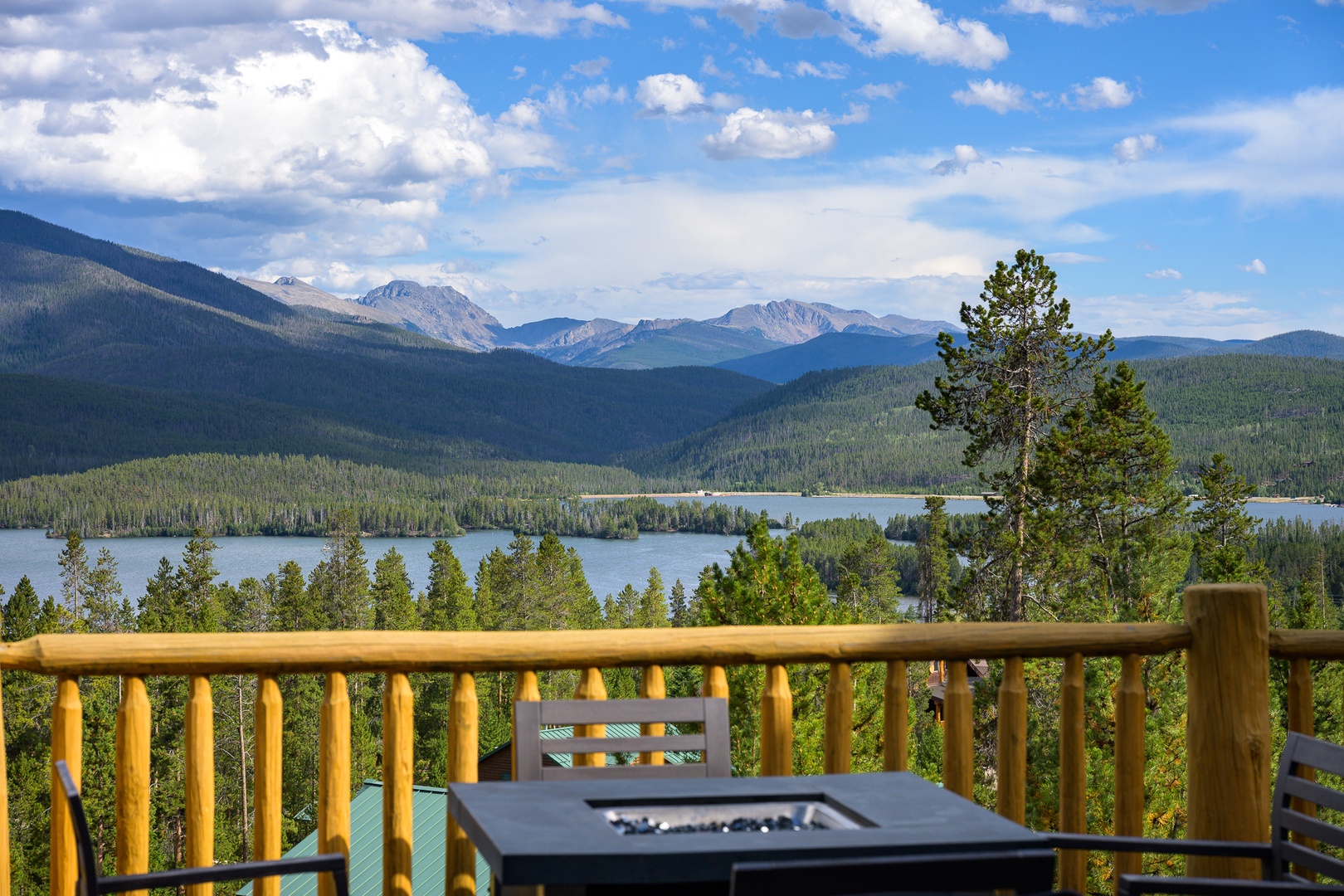 Gather around your private fire table and take in sweeping views of alpine forests, sparkling lake waters, and majestic mountain peaks stretching endlessly beyond your deck.