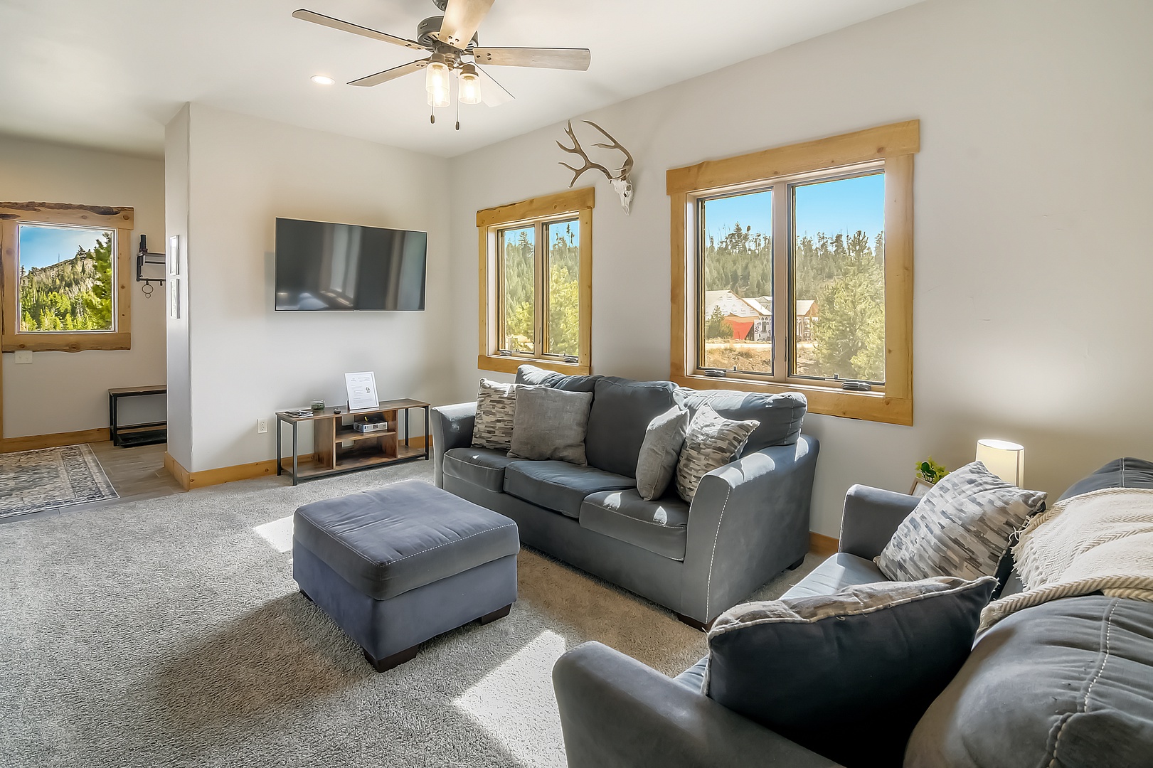 Downstairs living space with plush sofa. Great place for the kids to relax.