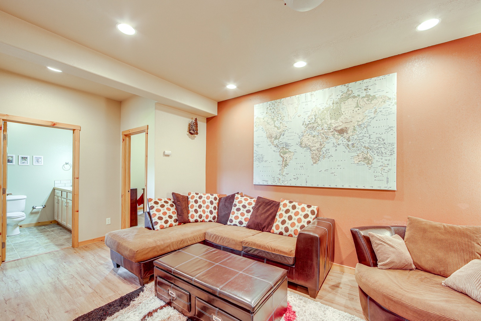 Sink into plush sectional seating while planning your next adventure using the world map above your head.
