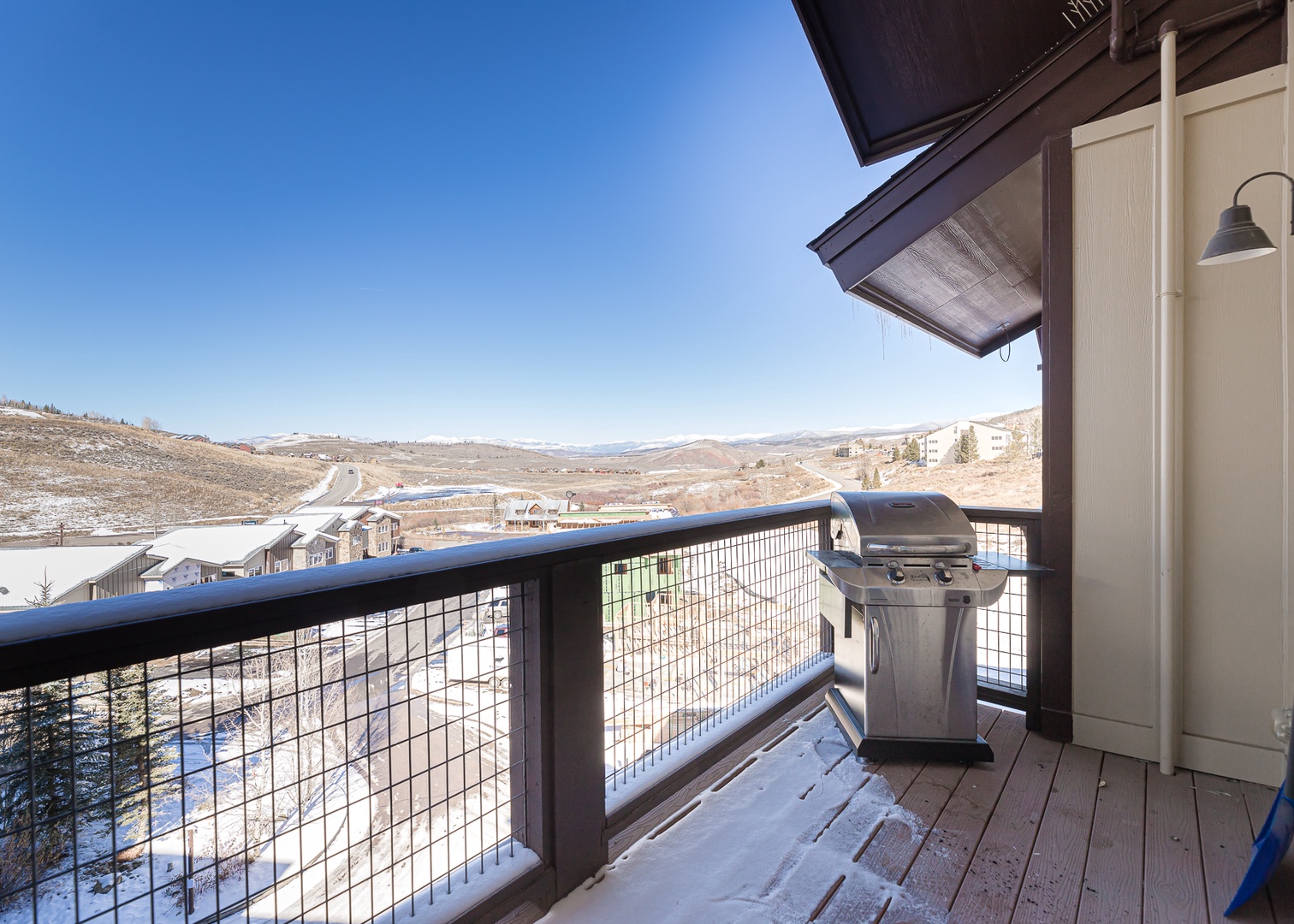 Grill your favorite meals while taking in breathtaking mountain views from your private balcony.