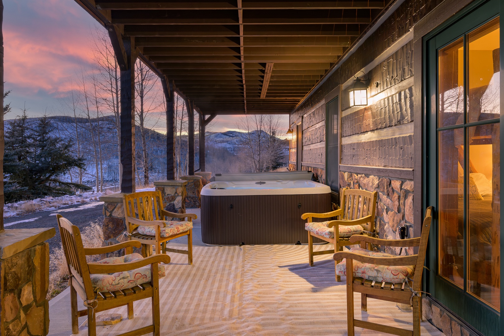 Soak in your private hot tub while watching sunset colors paint the mountain peaks, creating the perfect evening retreat.