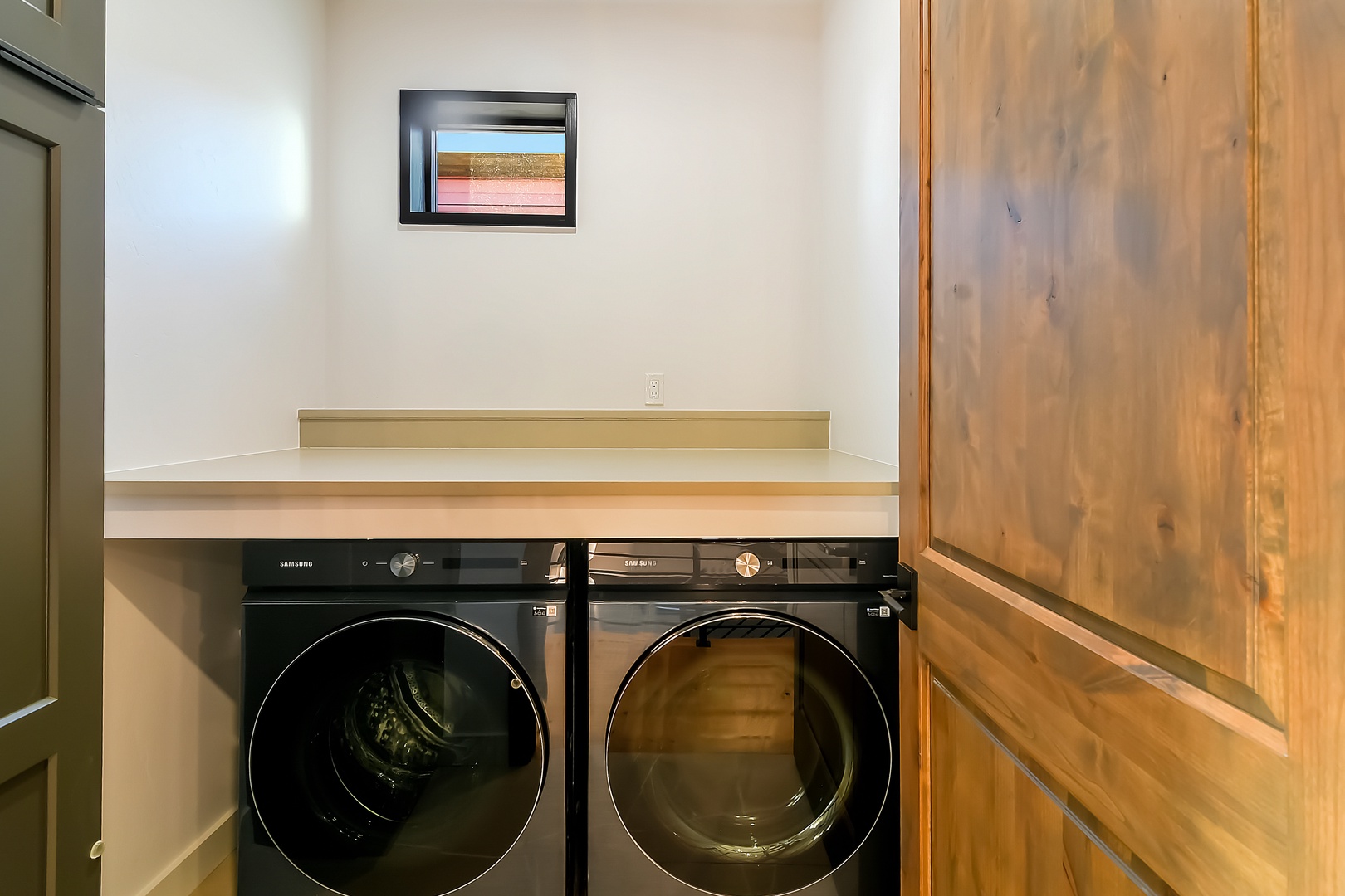Your dedicated laundry nook features modern appliances and convenient folding space, making it easy to keep your belongings fresh during your stay.