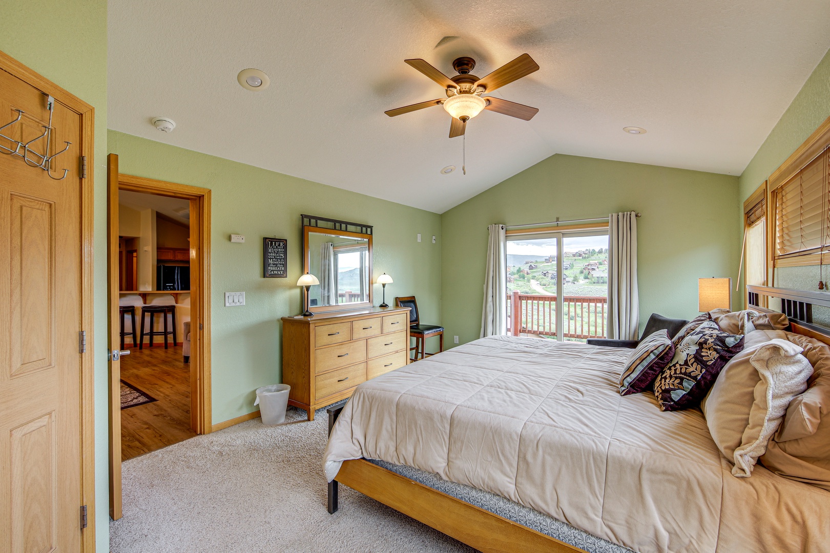 Wake up to mountain views from your king bed, where soft linens and gentle ceiling fan breezes create the perfect retreat.