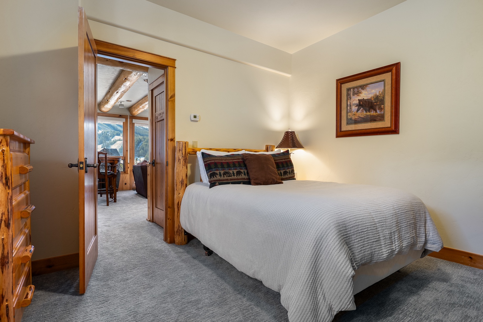 Rest easy in your cozy mountain bedroom with full and twin over twin beds