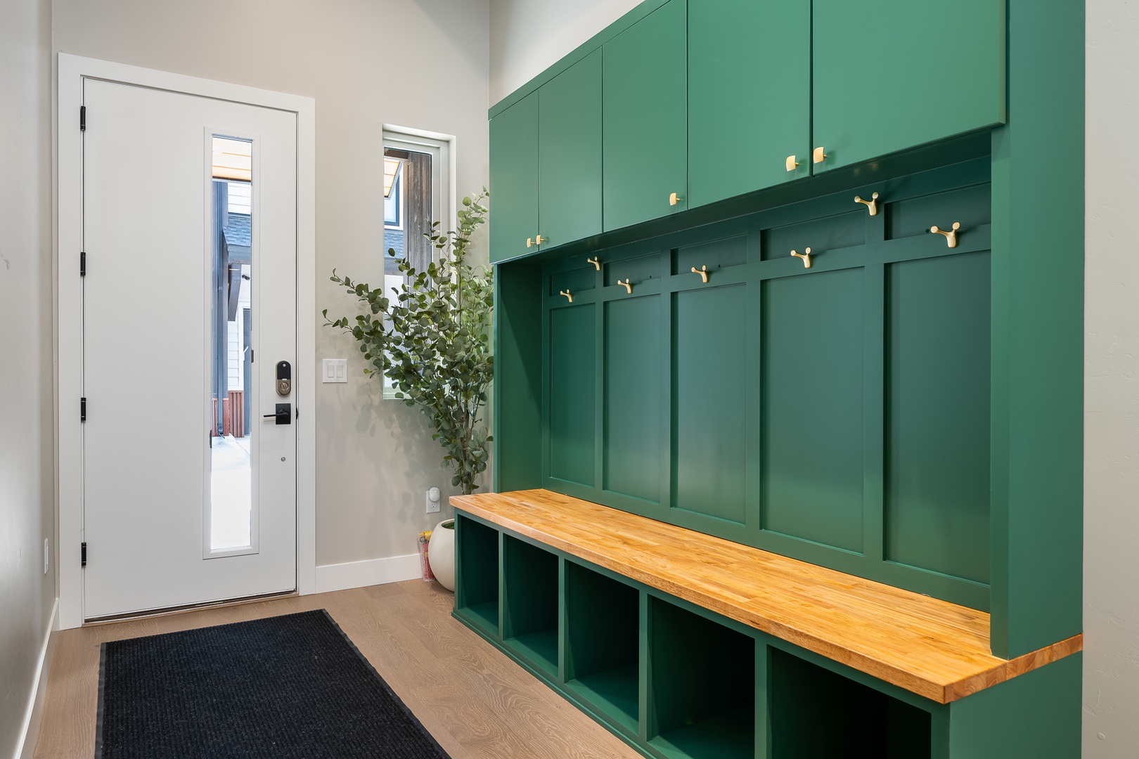 Keep all your adventure gear organized in this expansive entryway storage.
