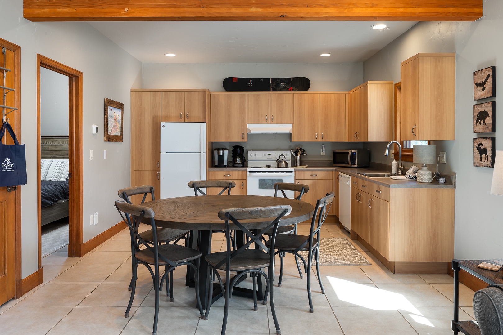Lower level kitchen with huge dining table for those last minute poker challenges! Or food...