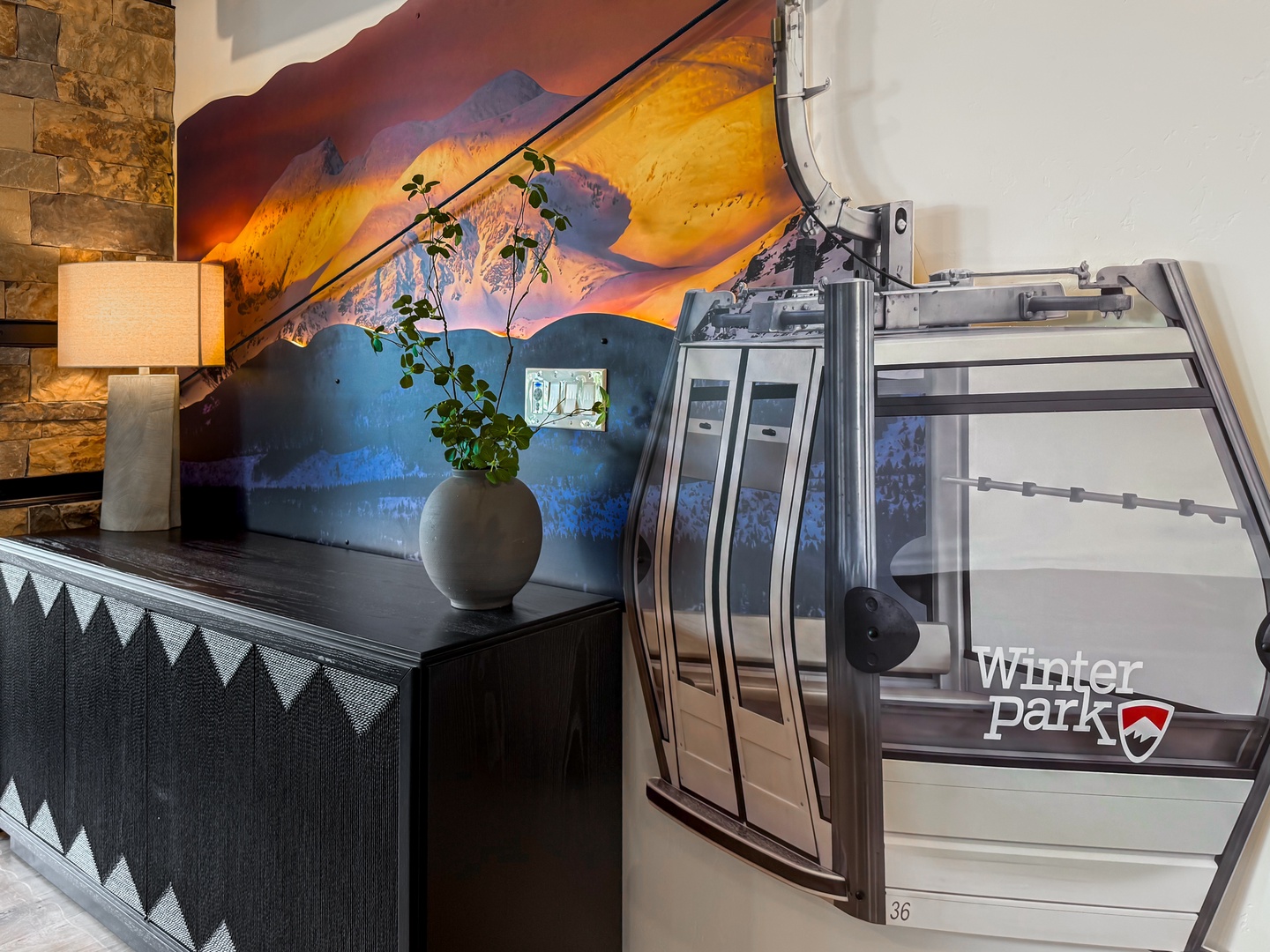 Spot the Winter Park gondola -inspired design at the top of the stairs!