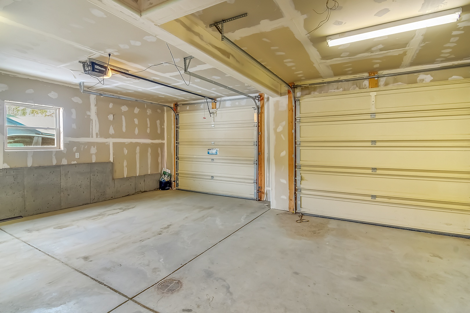 Spacious two-car garage with automatic doors provides secure parking for your vehicles during your stay.