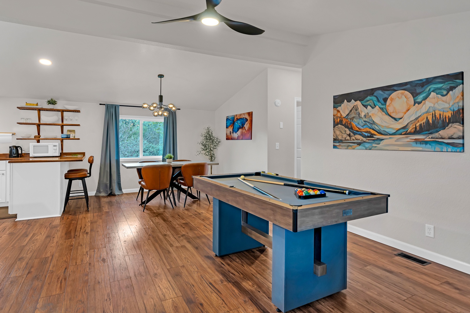 Challenge friends to pool while you unwind in this bright, open space complete with dining area and kitchen.