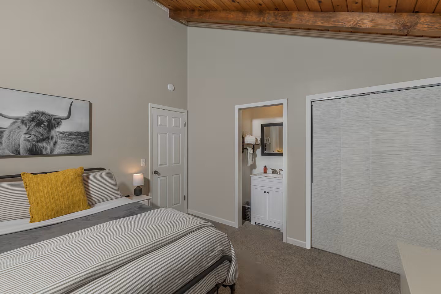Drift off beneath exposed beam ceilings in your cozy retreat, complete with ensuite sink and ample closet storage for your getaway essentials.
