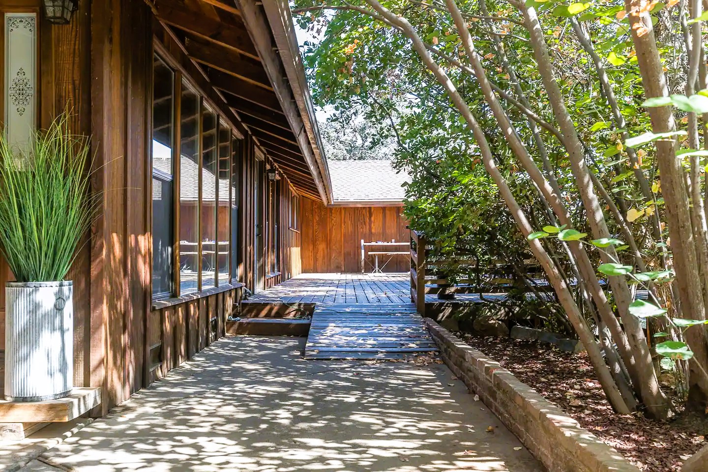 There is ramp access to the deck from the carport area.