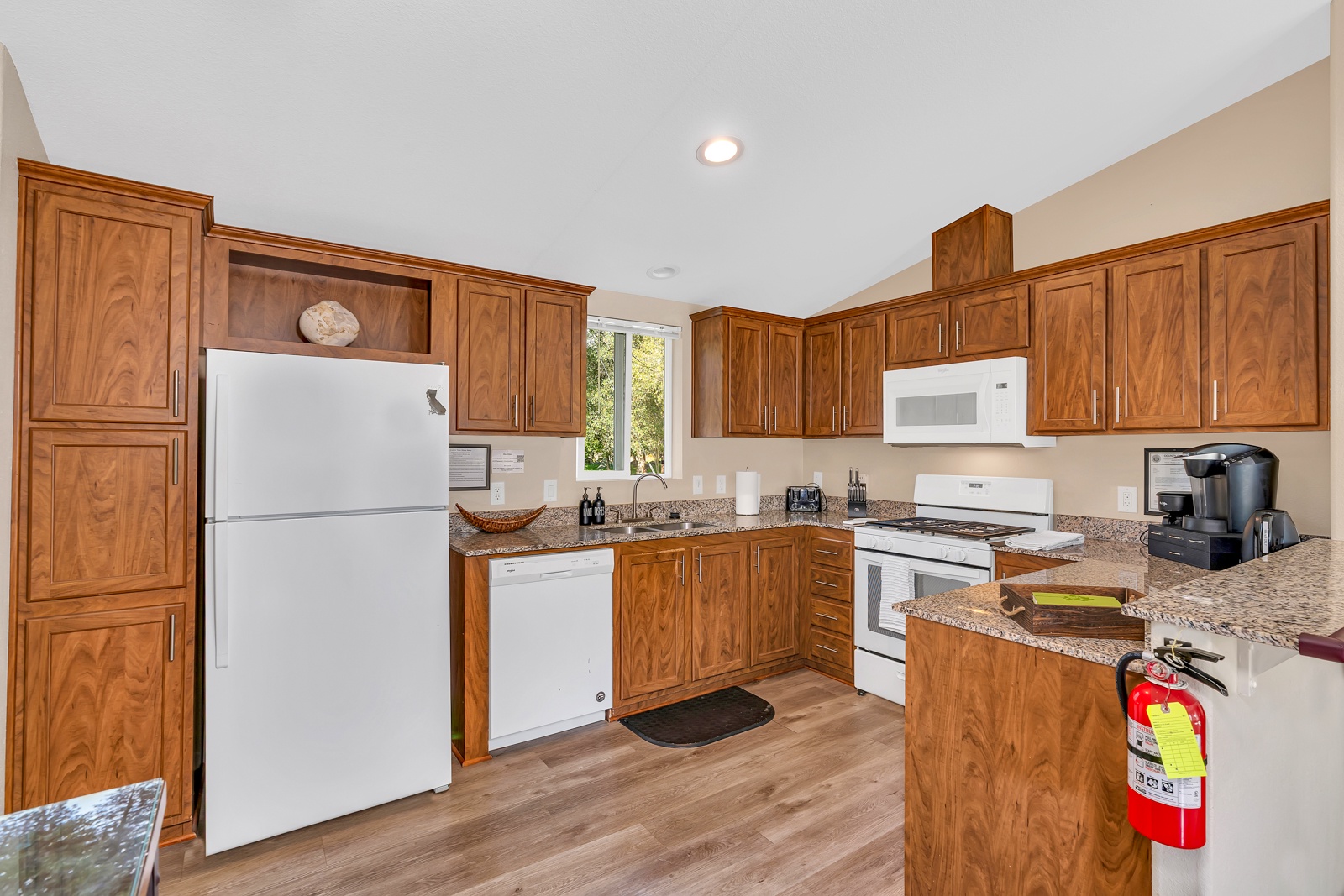 Large open kitchen is fully stocked and ready for cooking up a quick lunch or nice dinner.