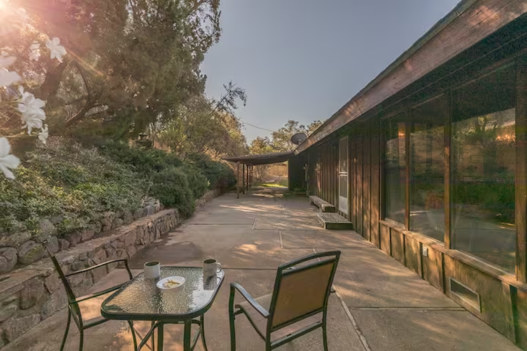 Enjoy a cup of coffee on the patio off the kitchen side door.